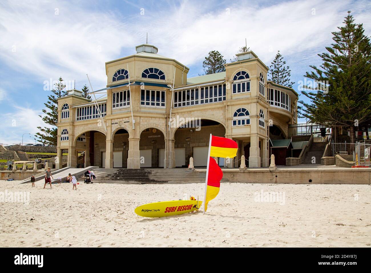 Perth, Australia - October 7th 2020: Surf lifesavers flag and board on the beach outside Cottesloe Indiana Tearooms Stock Photo