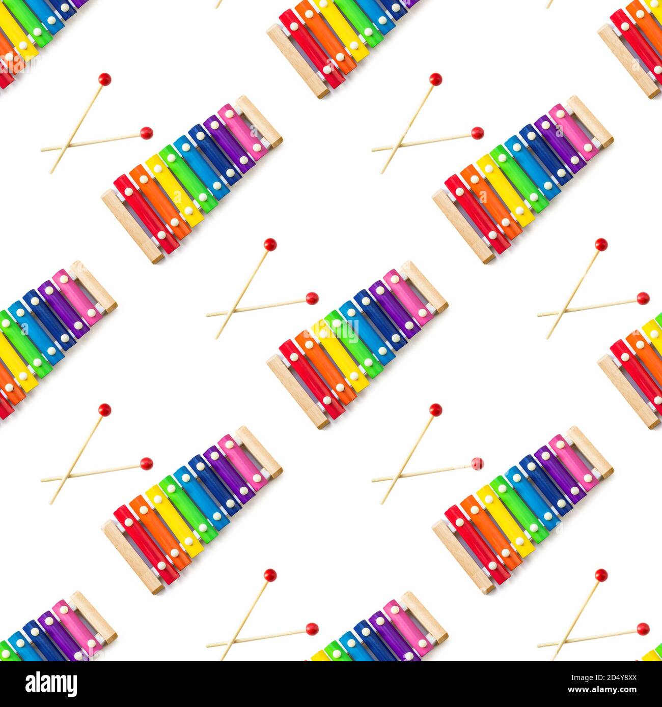 Seamless pattern of Rainbow Colored Wooden Toy 8 tone Xylophone glockenspiel isolated on white background with clipping path. toy glockenspiel made of Stock Photo