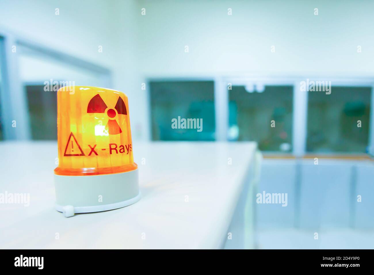 Ionizing radiation hazard symbol in xray laboratory, blurred