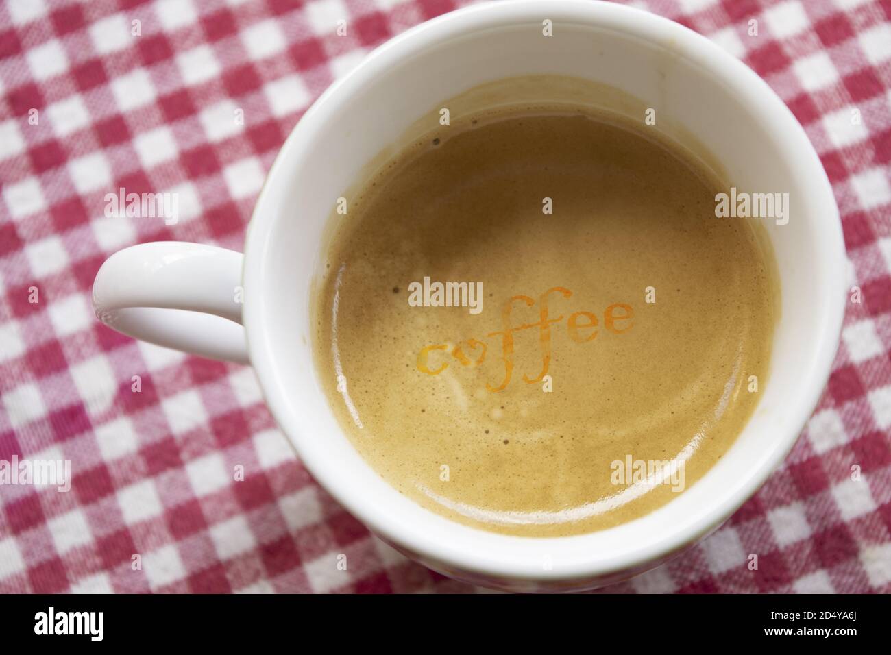 small cup of creamy espresso coffee Stock Photo