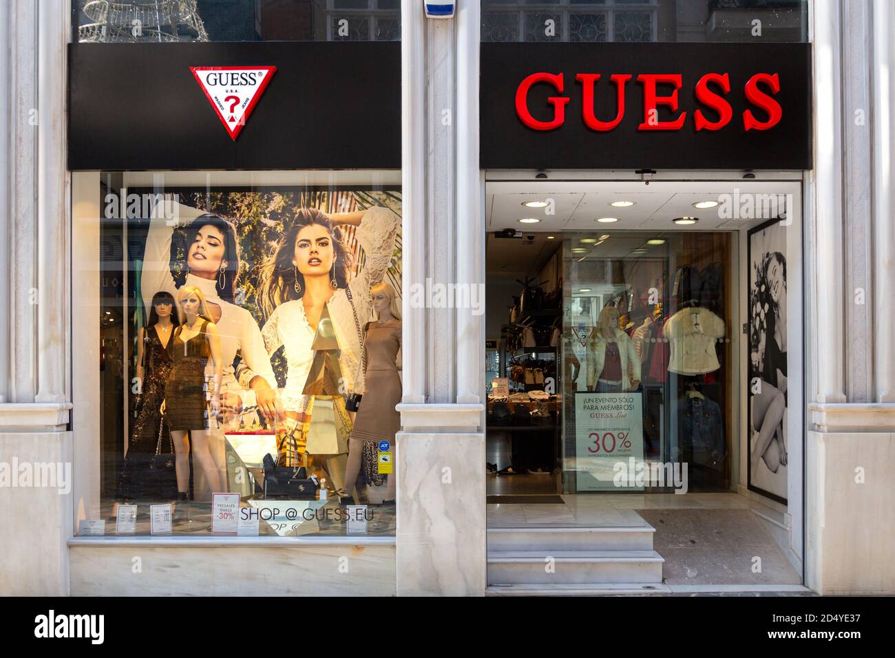 Guess display window. Guess fashion brand clothing store Stock Photo - Alamy