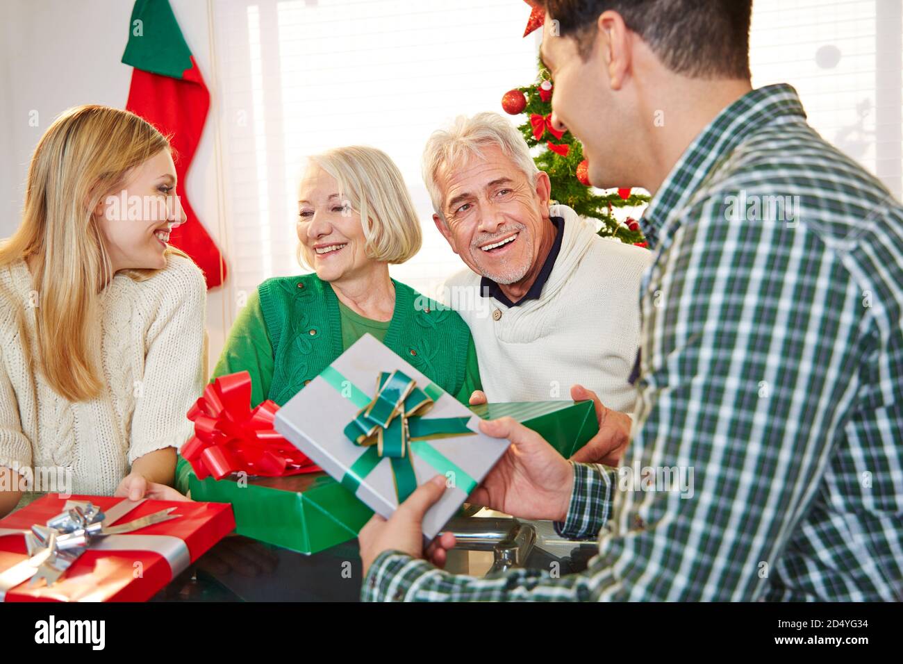 Happy family presents Christmas presents Stock Photo