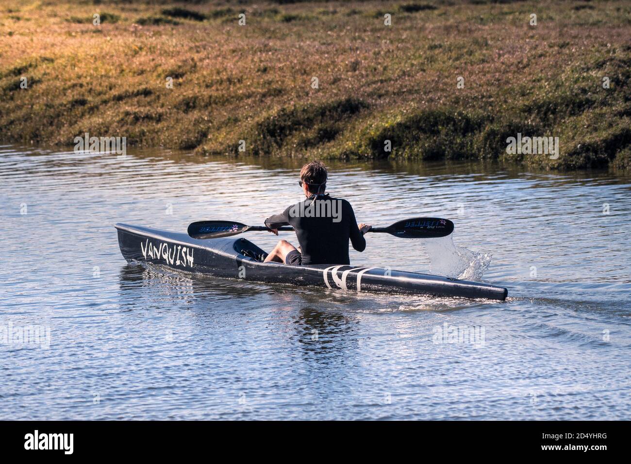 A Kayaker paddling a Vanquich Kayak along the Gannel River in Newquay