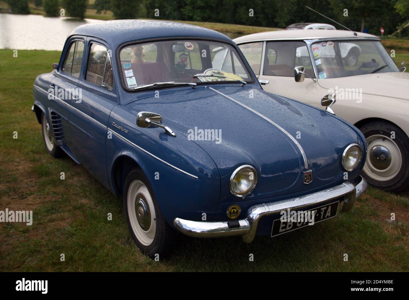 Renault Dauphine vintage French car, with a Citroen DS behind it, in     France Stock Photo