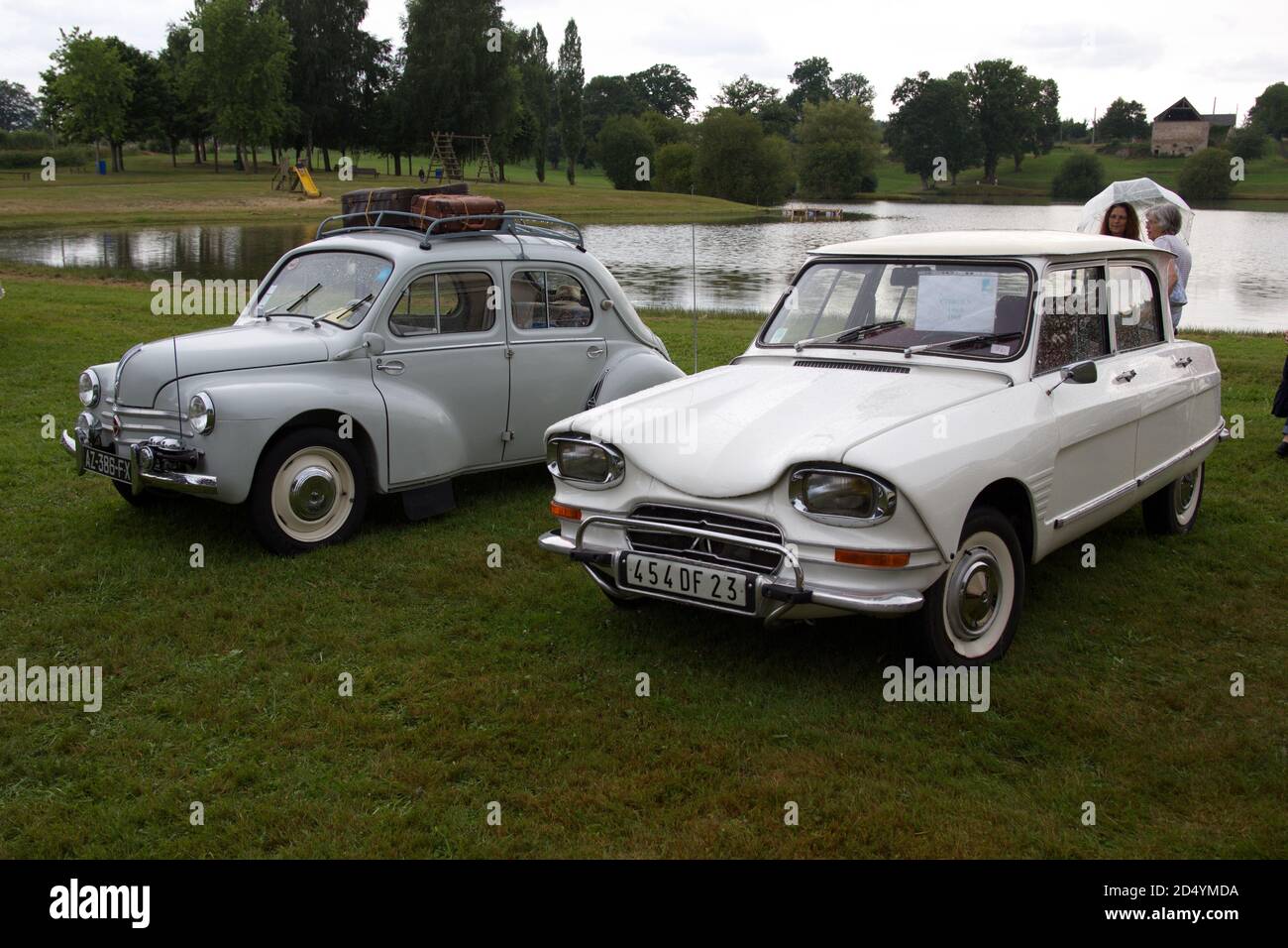 Citroen Ami 6 (white) and Renault 4CV (grey) vintage French cars in     France Stock Photo
