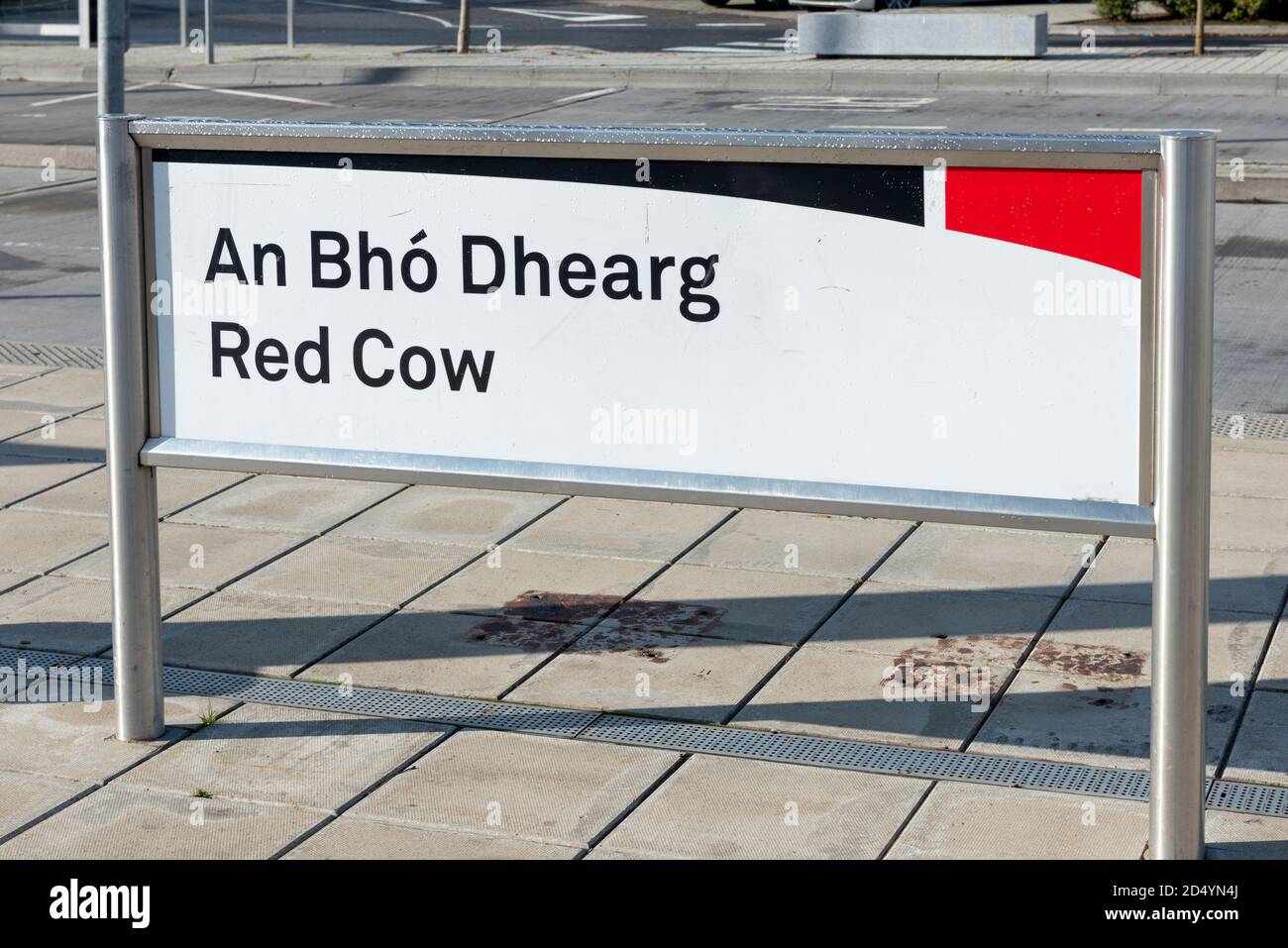 Red Cow signpost sign for the Luas tram stop and bus hub at the Red Cow Luas Stop in West Dublin, Ireland Stock Photo