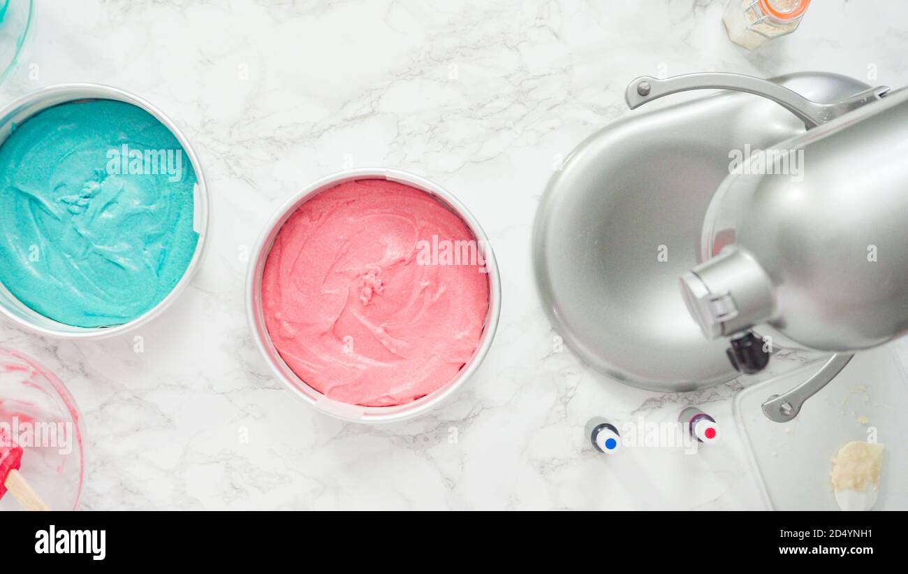 Step by step. Flat lay. Mixing food coloring into a cake batter to bake ...