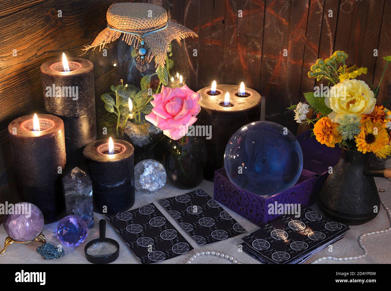 Mysterious still life with tarot cards, black candles and crystal ball on  witch table. Esoteric, gothic and occult background with magic objects.  Hall Stock Photo - Alamy
