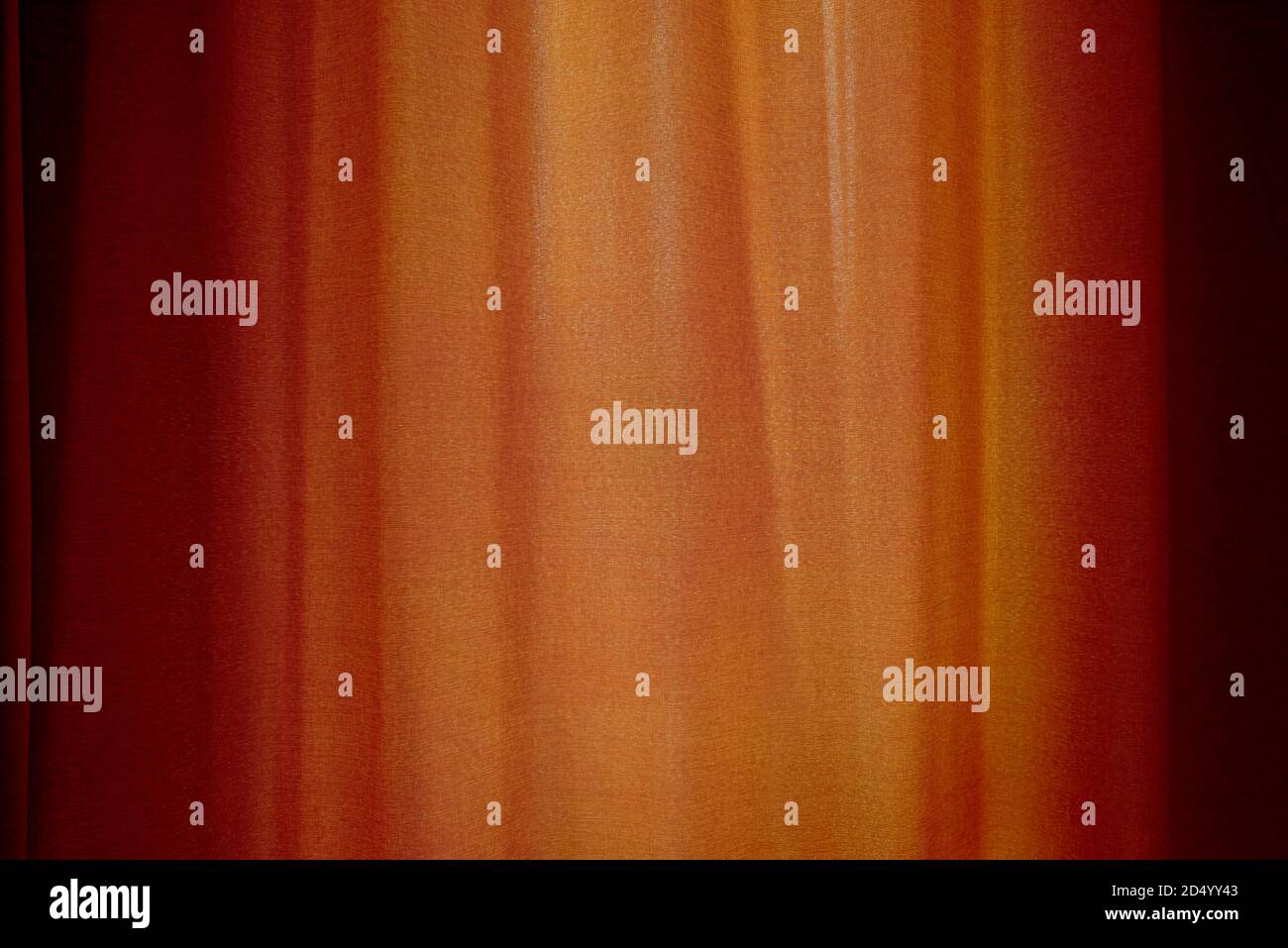 Behind closed curtains, wrinkled window blinds as background Stock Photo