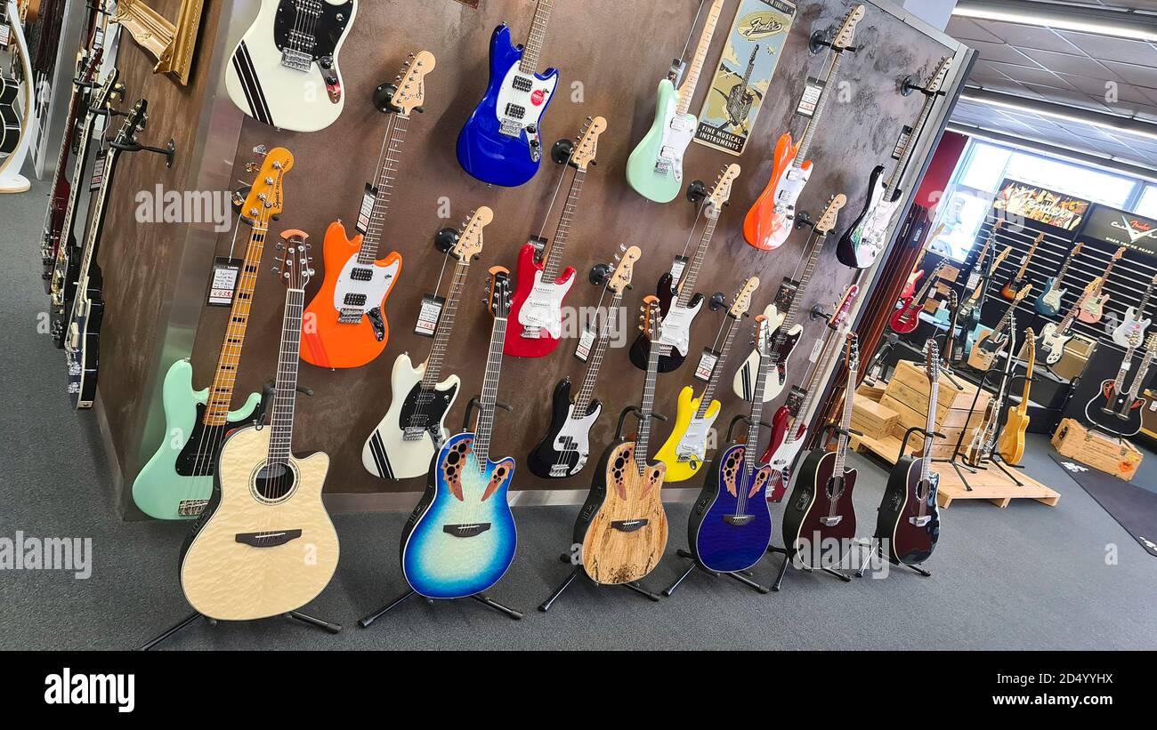 guitars in a music store, Germany Stock Photo - Alamy
