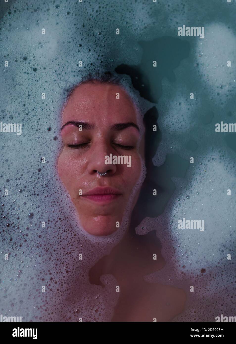 ALICANTE, SPAIN Oct 01, 2020 Woman portrait enjoying a hot tube bath