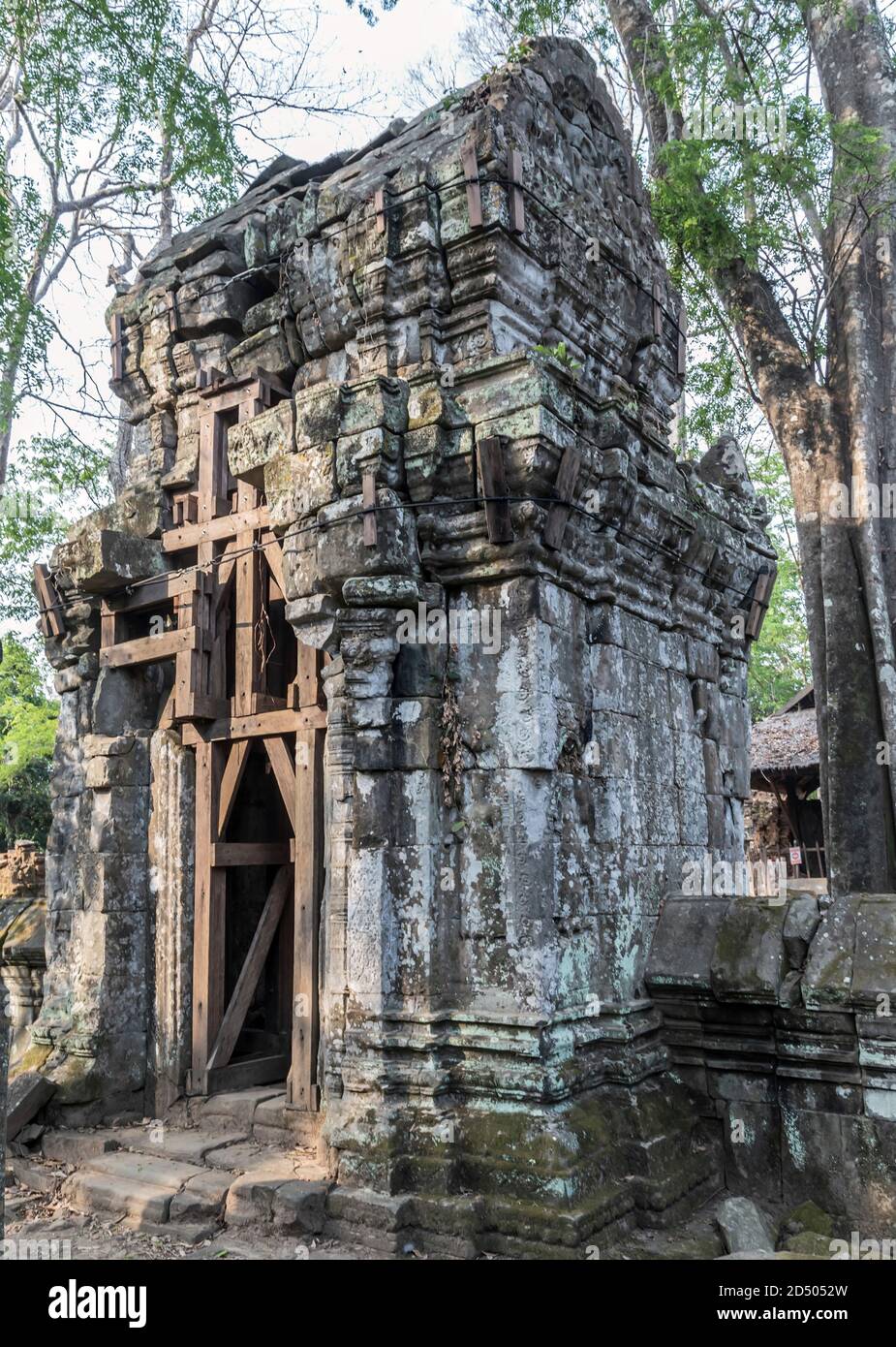 Prasat Krahom red bricks Hindu Temple in Koh Ker. Moss on the stone