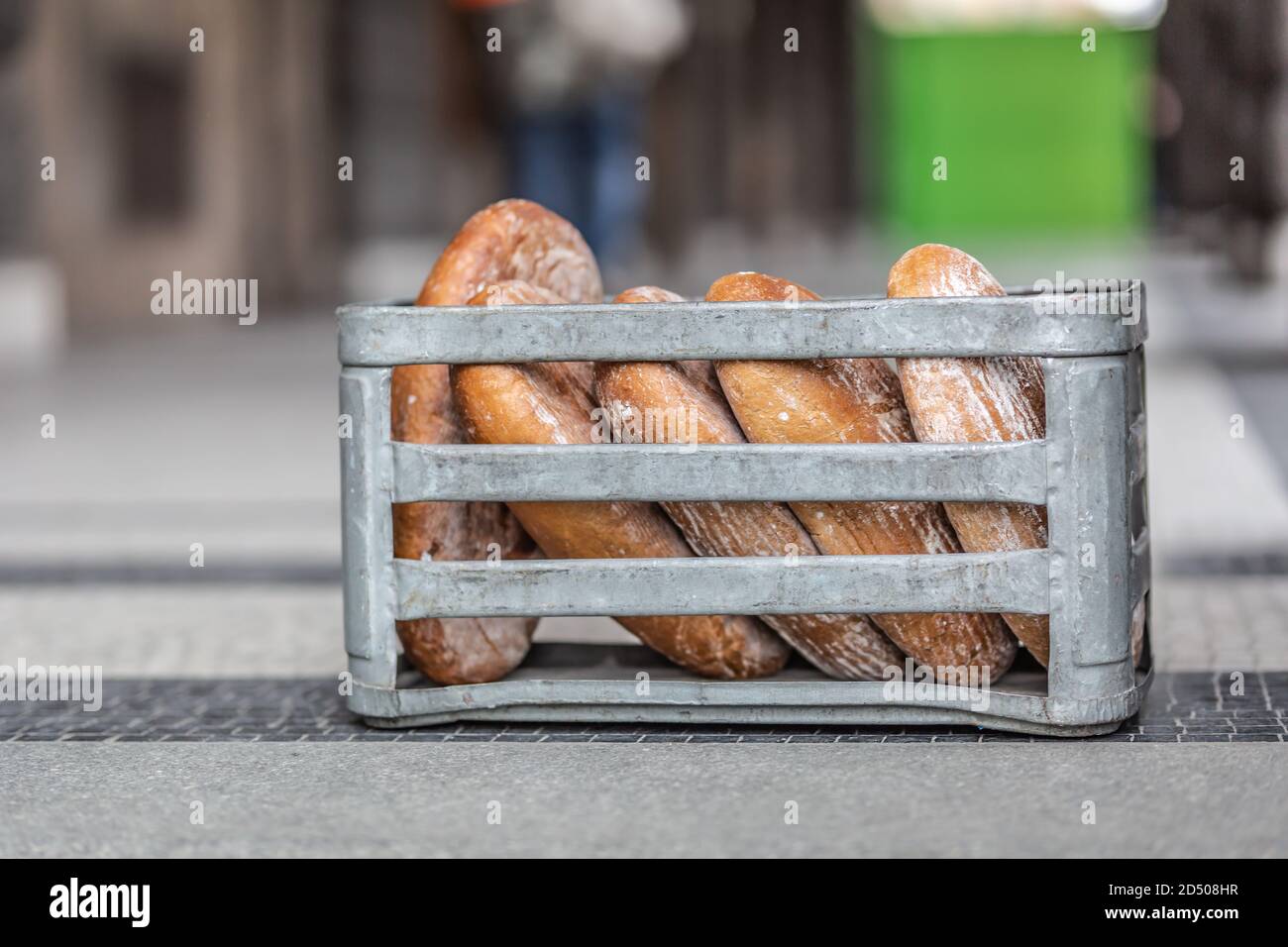 Box with a freshly baked bread delivered in front of the store Stock Photo
