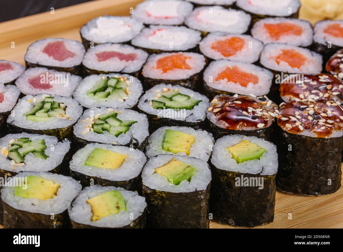 Japanese cuisine - Kappa Maki set with fish Stock Photo - Alamy