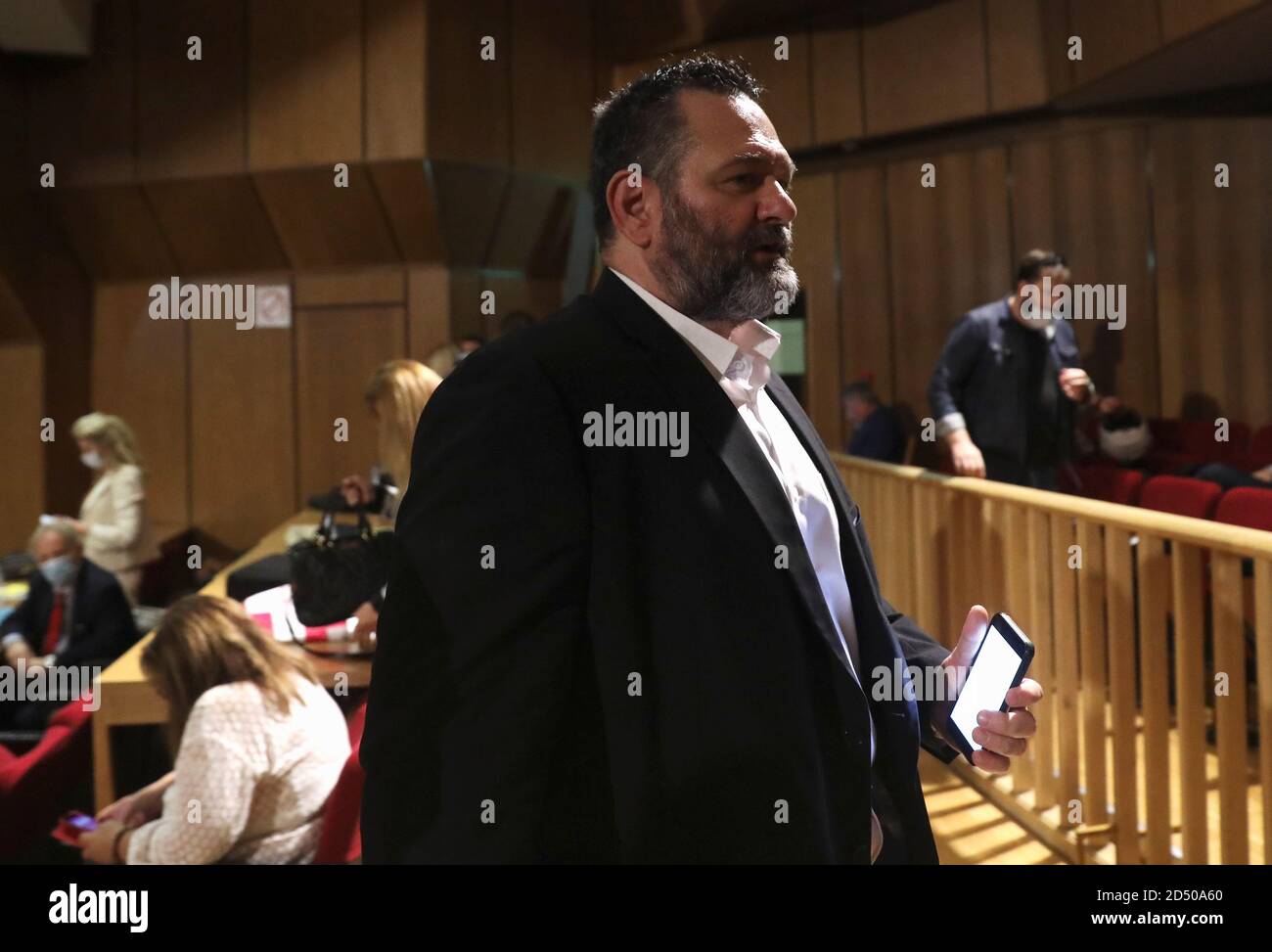 Greek Member of the European Parliament and a former member of Golden Dawn  Ioannis Lagos is seen during a break as he attends the trial of leaders and  members of the Golden