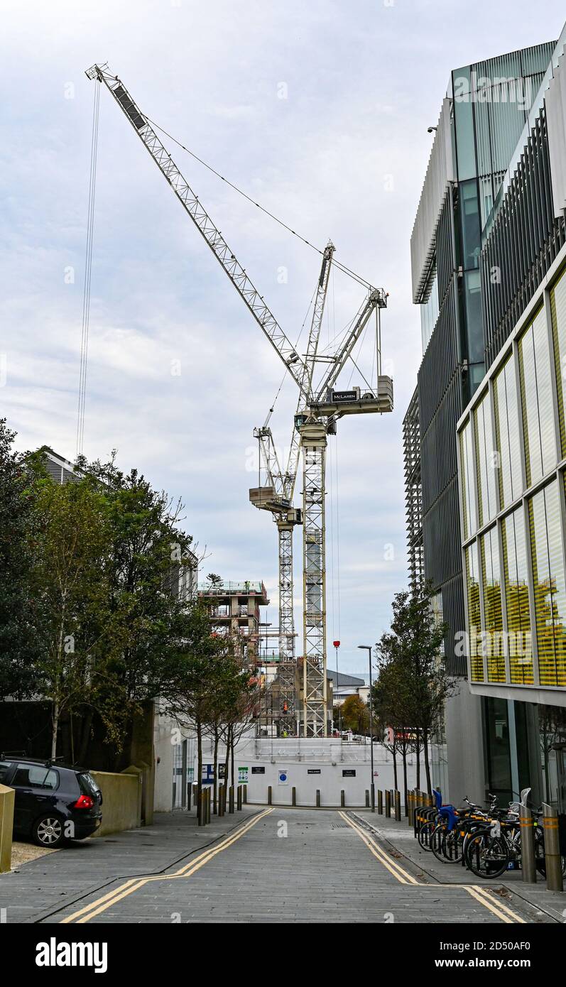 Cranes on the Edward Street Quarter new homes development construction site Brighton East Sussex UK Stock Photo