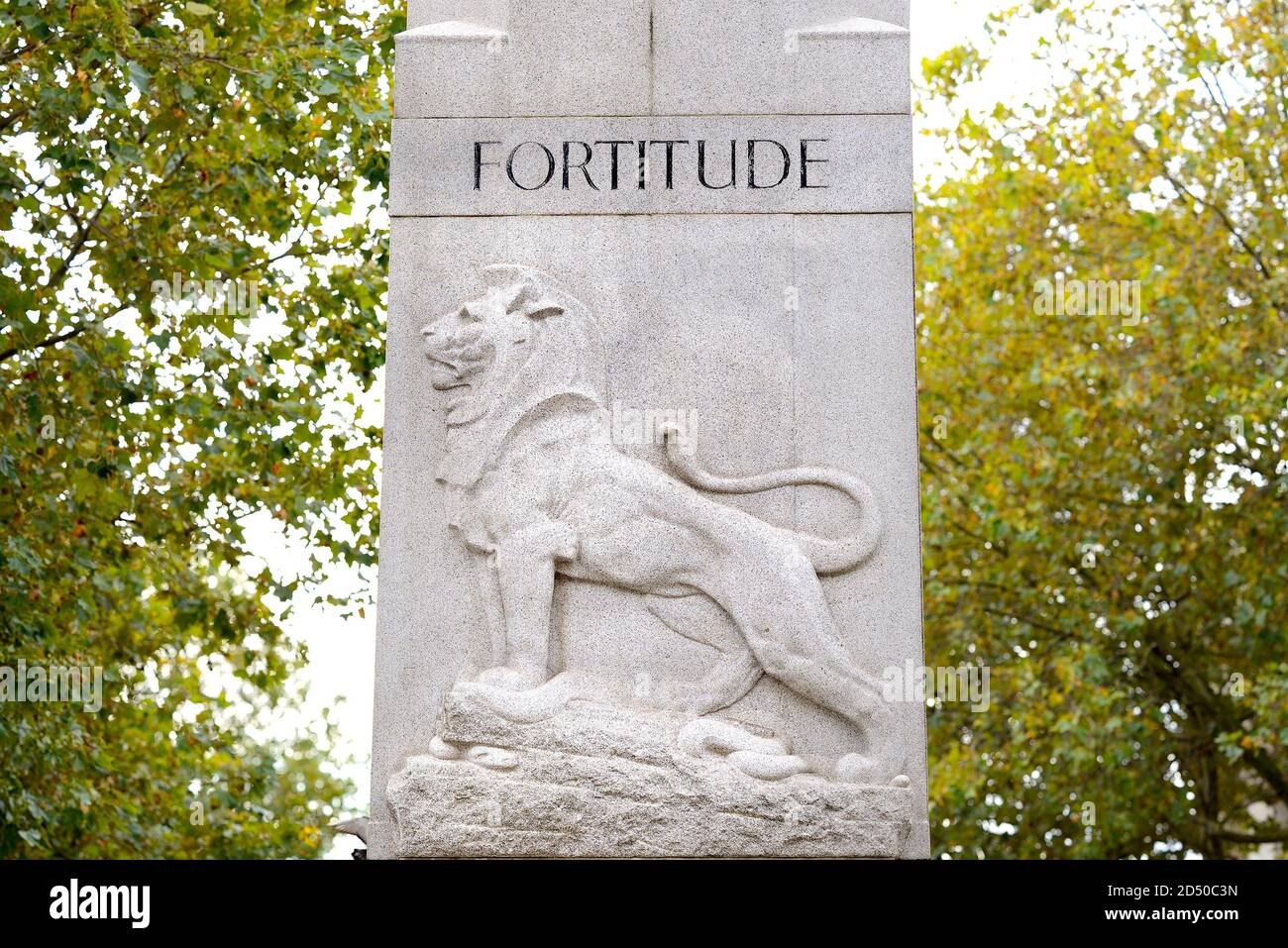London, England, UK. Monument (George Frampton; 1920) to Edith Cavell (1865-1915; nurse and WW1 heroine) in St Martin's Place. Lion and 'Fortitude' Stock Photo
