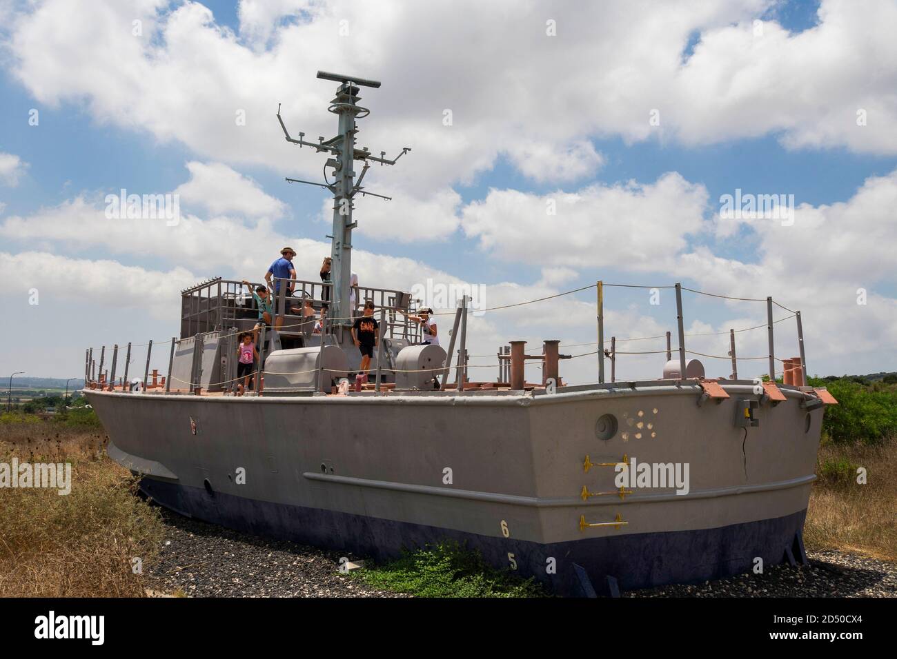 Children explore and play on an Out of Service Israeli Navy patrol boat Dabur class Stock Photo
