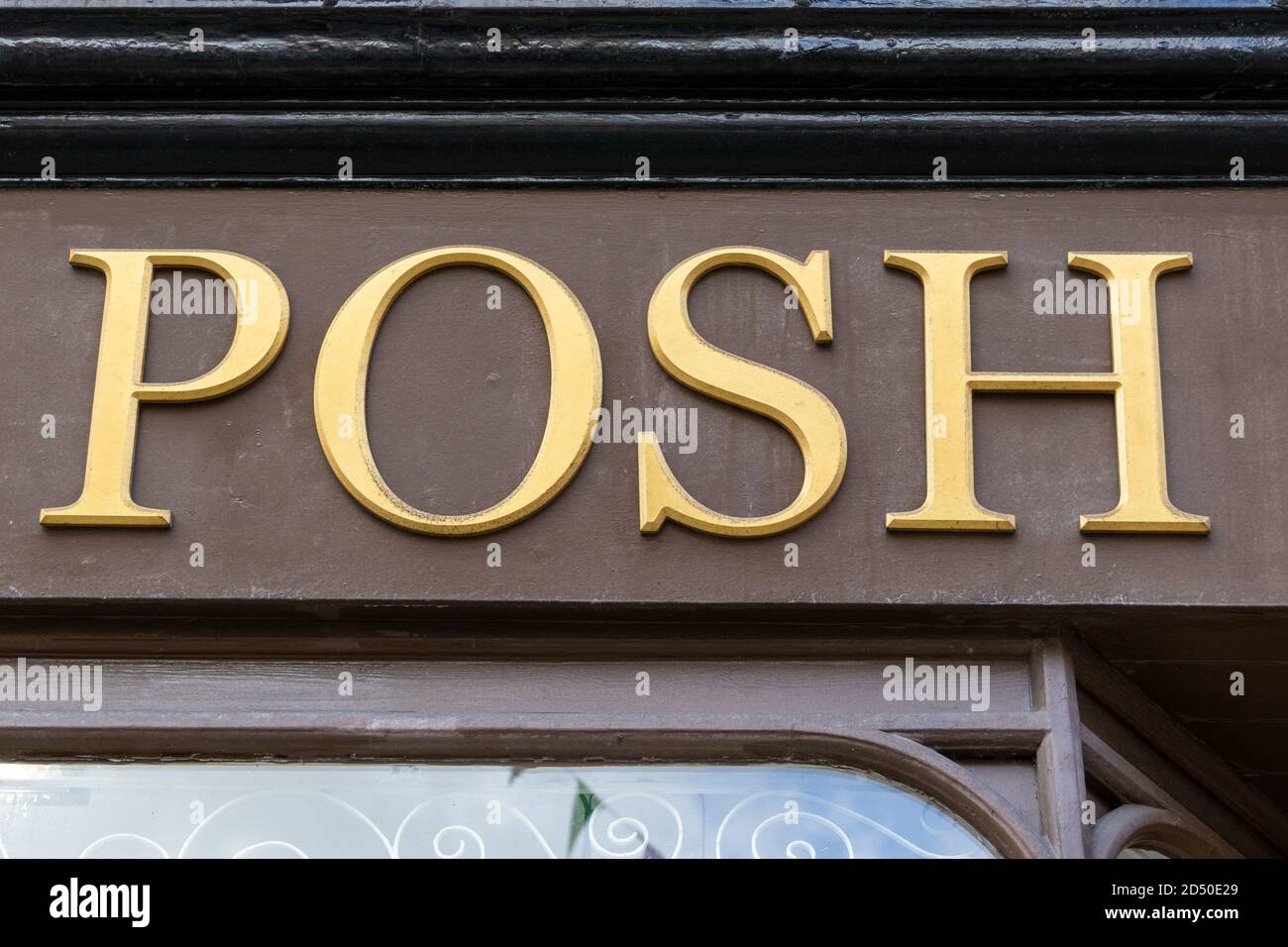 POSH store sign in gold lettering, Eastbourne, UK. Stock Photo
