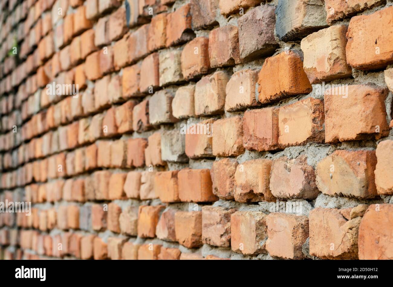 Red brick wall in receding perspective. Geometric composition of ...