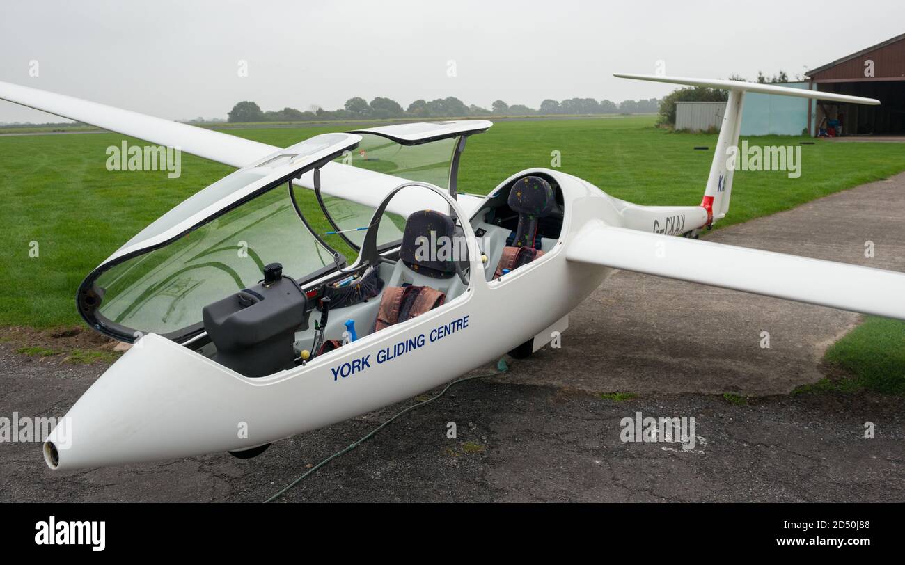 View of one of the gliders on the tarmac at York Gliding Centre, Rufforth, North Yorkshire with open canopy ready for its next flight Stock Photo