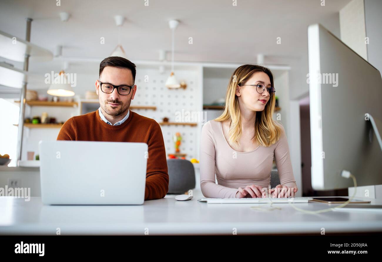 Young creative managers team working with new startup project in office Stock Photo