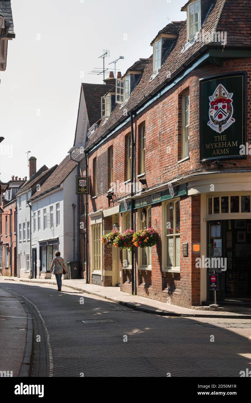 View in summer of a woman walking alone along historic Kingsgate Street