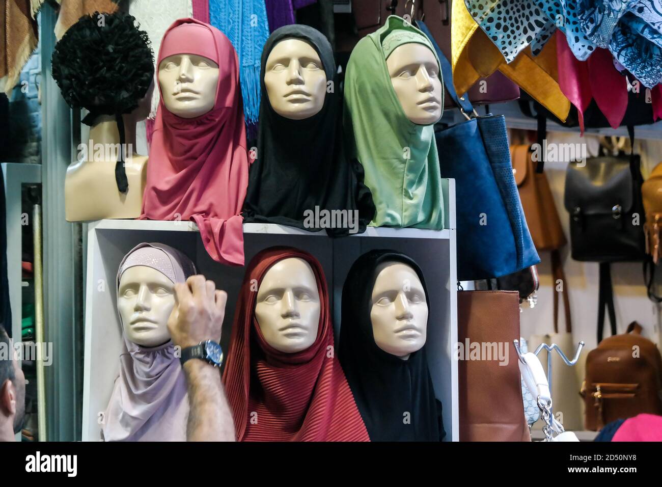Lifeless models for hijab in front of the store in Istanbul. İslamic dresses. Hijabs. Muslim dresses Stock Photo