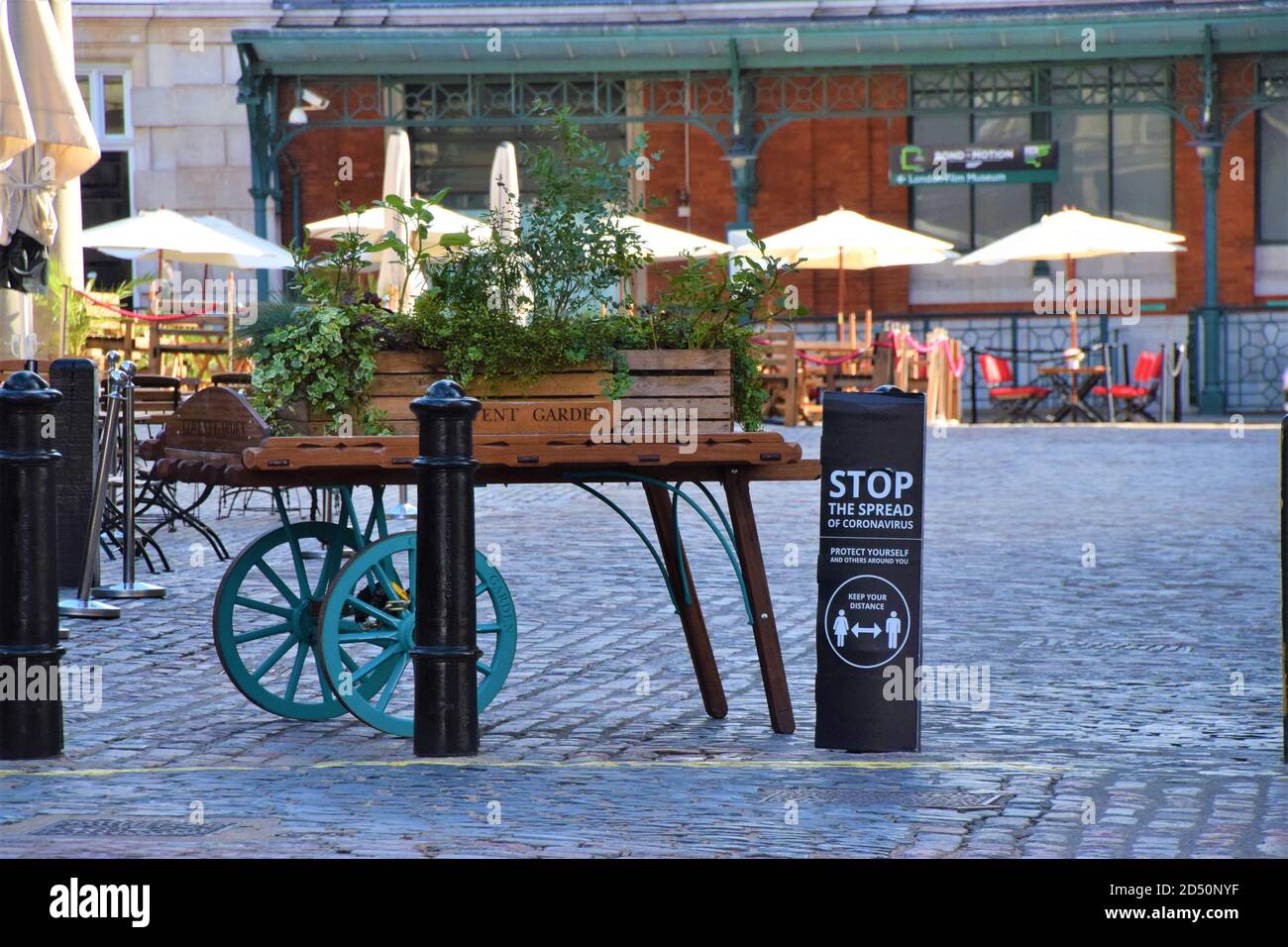 Stop The Spread Of Coronavirus social distancing street sign in Covent Garden, London Stock Photo