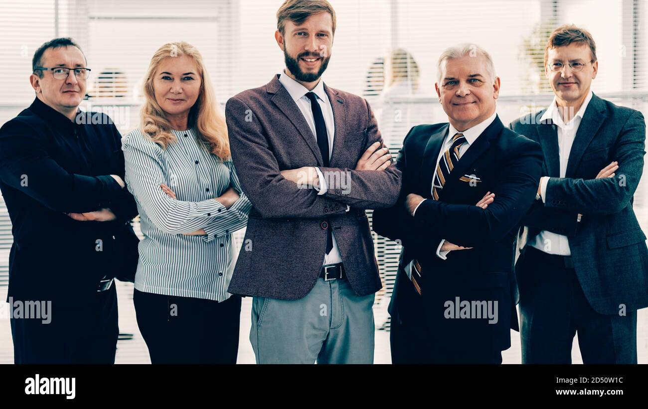 group of diverse business people standing in the office Stock Photo - Alamy