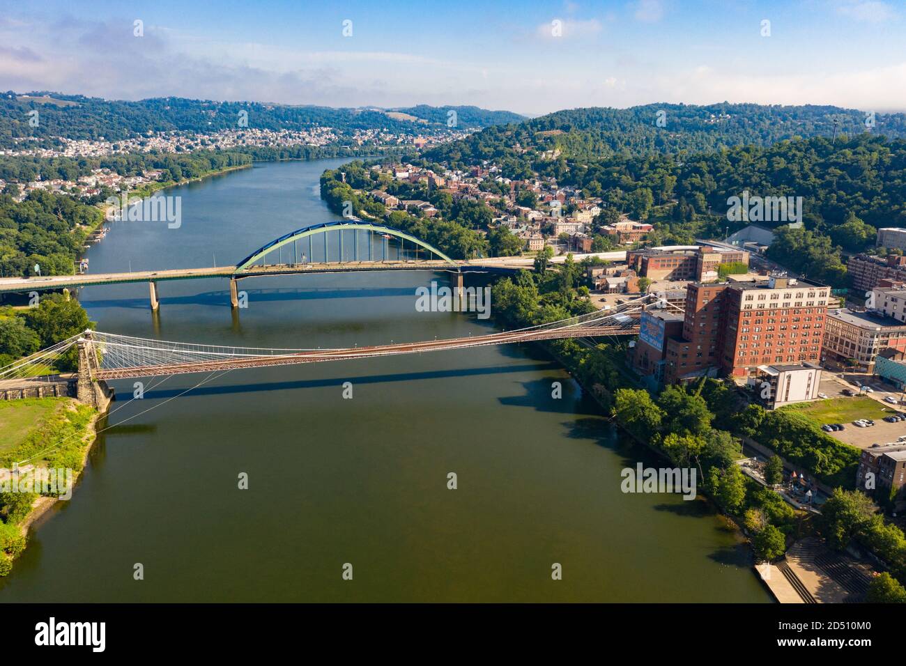 Wheeling Suspension Bridge and Fort Henry Bridge, Ohio River, Wheeling, West Virginia, USA Stock Photo