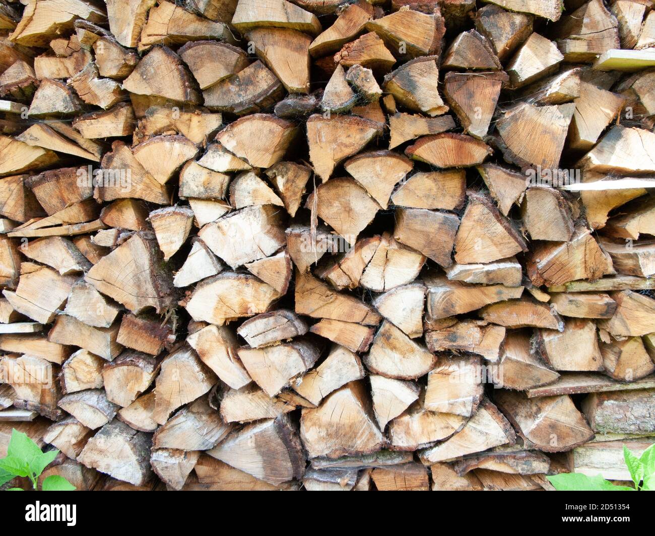 Stacked firewood ready to be used Stock Photo Alamy