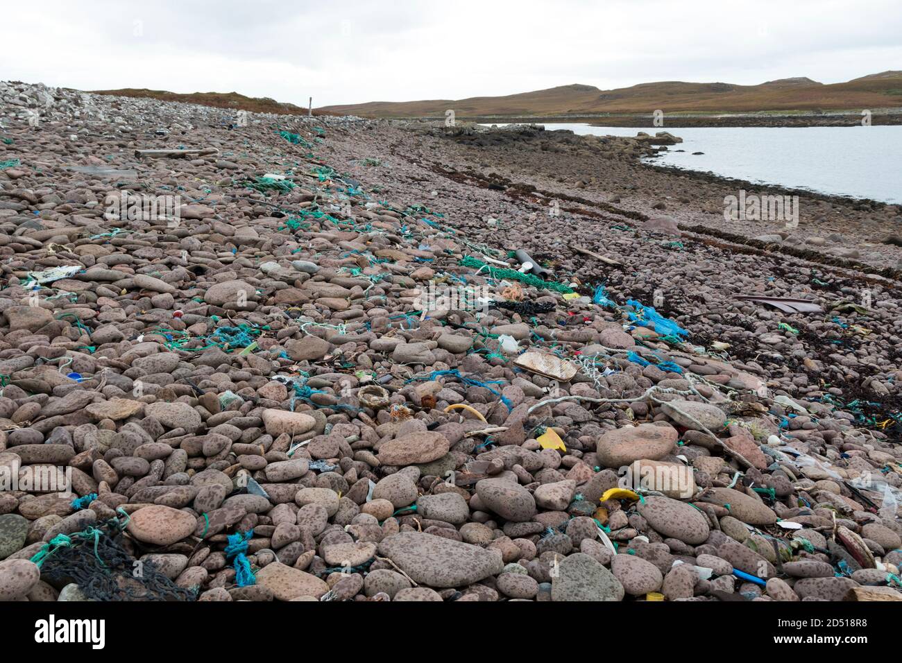 Plastic Waste and other Debris Washed up on the Shore Near Old Dornie on the Coigach Peninsula, Wester Ross, Northwest Highlands of Scotland, UK Stock Photo