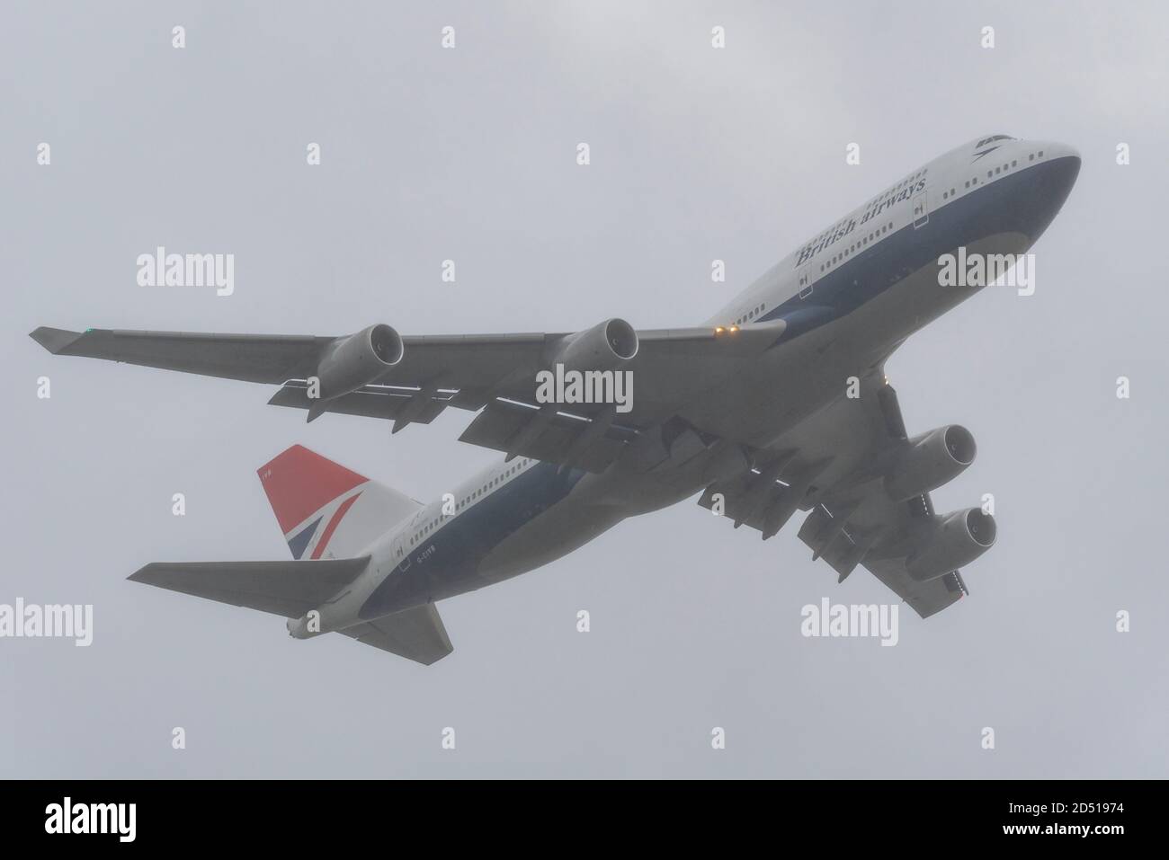 Farewell day for British Airways Boeing 747 Jumbo Jet airliner planes after COVID-19 travel downturn. Centenary retro scheme G-CIVB taking off Stock Photo