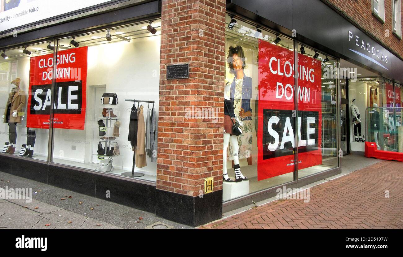 Closing down sale poster in window of a Peacocks store in London 