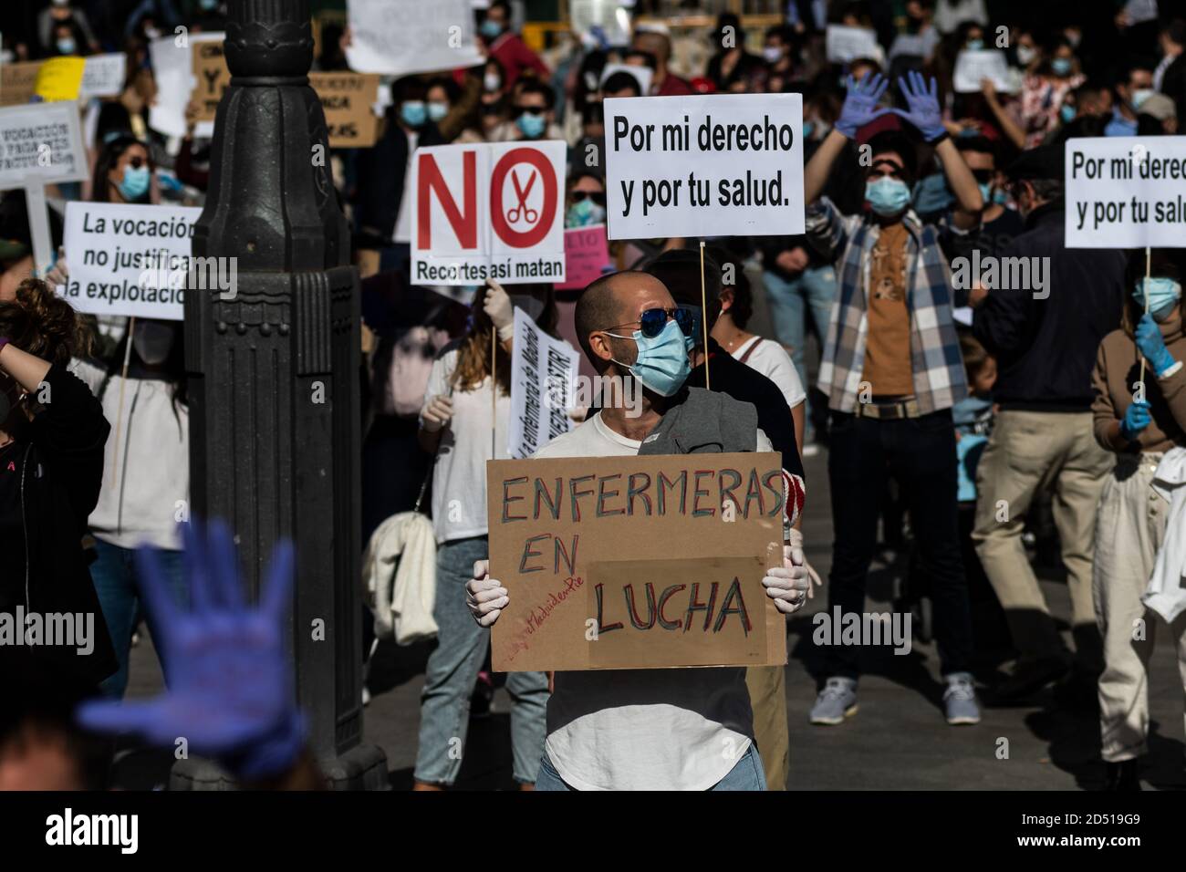 Madrid, Spain. 12th Oct, 2020. Nurses with placards during a protest in Sol Square. Nurses are demanding better working conditions and protesting against the management of the coronavirus crisis in the public health care system. Credit: Marcos del Mazo/Alamy Live News Stock Photo