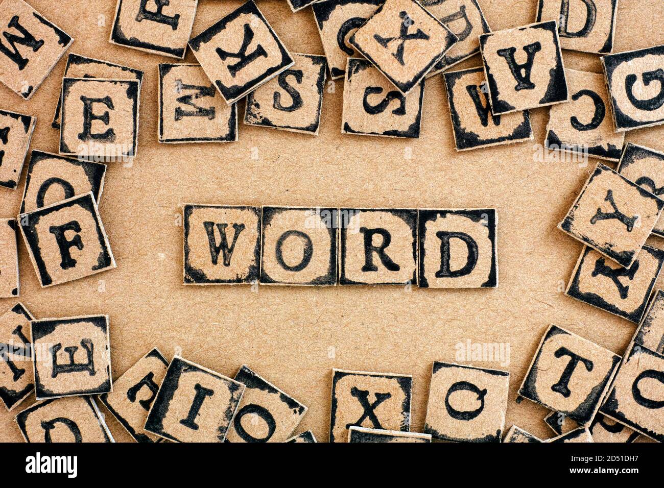 Text Word spelled out from cardboard letters made by black
