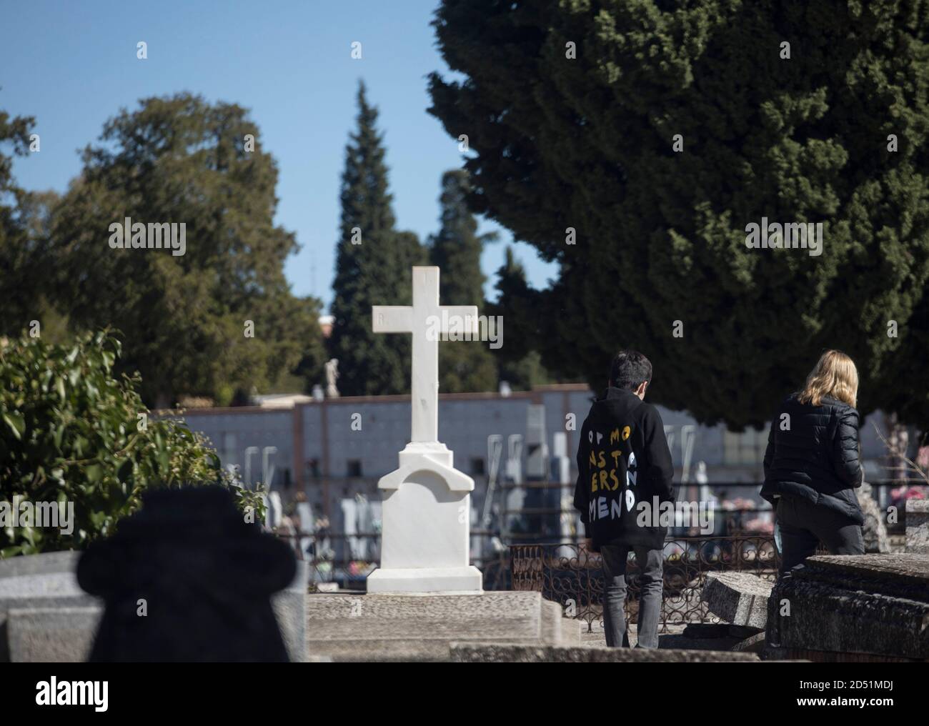 Madrid, Spain. 12th Oct, 2020. Mourners stand in the Almudena cemetery on the Spanish National Day. Spain is currently struggling with a particularly violent second wave of corona and has the highest infection rates in Western Europe. Credit: Javier Carbajal/dpa/Alamy Live News Stock Photo
