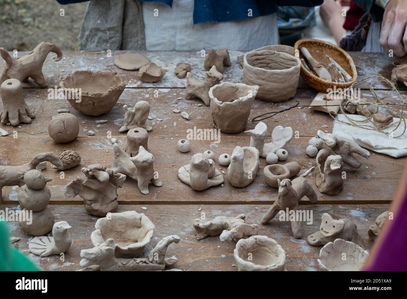 Moscow, Russia September 5, 2020. Children sculpt clay figurines in