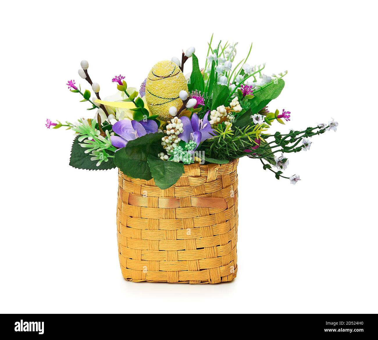 Easter basket from a flower arrangement on white background Stock Photo