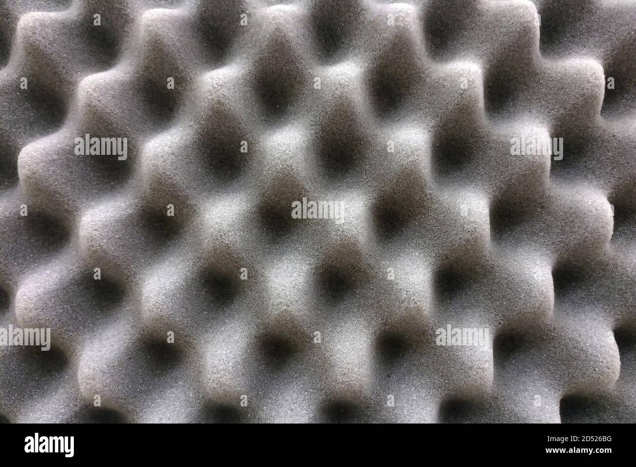 Recording studio sound dampening acoustical foam, background. Noise isolating protective and shock, texture. Background of sound absorbing sponge, wal Stock Photo