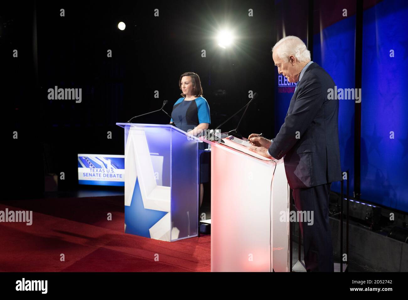 Austin TX USA, Oct. 9 2020: Democratic challenger MJ Hegar (l) answers a question while debating three-term U.S. Senator John Cornyn. The 44-year old decorated war veteran is attempting to unseat Cornyn, a Republican stalwart. Hegar has outspent Cornyn as the two are locked in a tight race three weeks before Election Day. Stock Photo