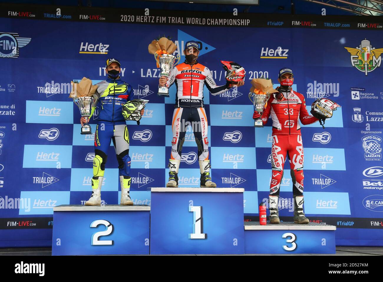 Toni Bou (1), Jeroni Fajardo (2) and Jorge Casales (3), during the award ceremony of round 4 of the Italian TrialGP, at Moto Club Lazzate circuit on O Stock Photo