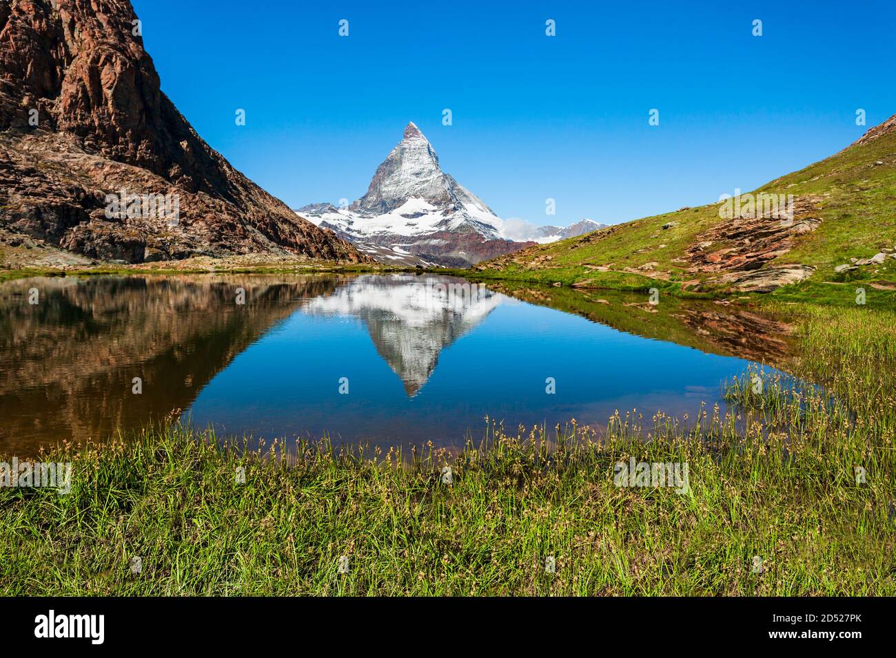 Riffelsee lake and Matterhorn mountain in the Alps, located between Switzerland and Italy Stock Photo