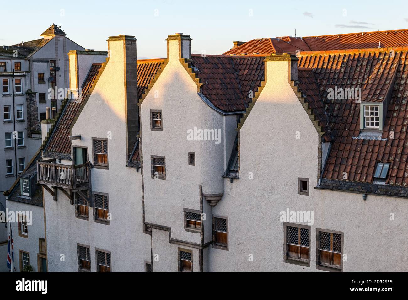 Leith, Edinburgh, Scotland, United Kingdom, 12th October 2020. UK Weather: setting sun on Lamb's House, a historic 16th century Grade A-listed former Hanseatic merchant's house, one of the oldest buildings in Leith, restored by architect Nicholas Groves Raines with a crow stepped gable roofline Stock Photo