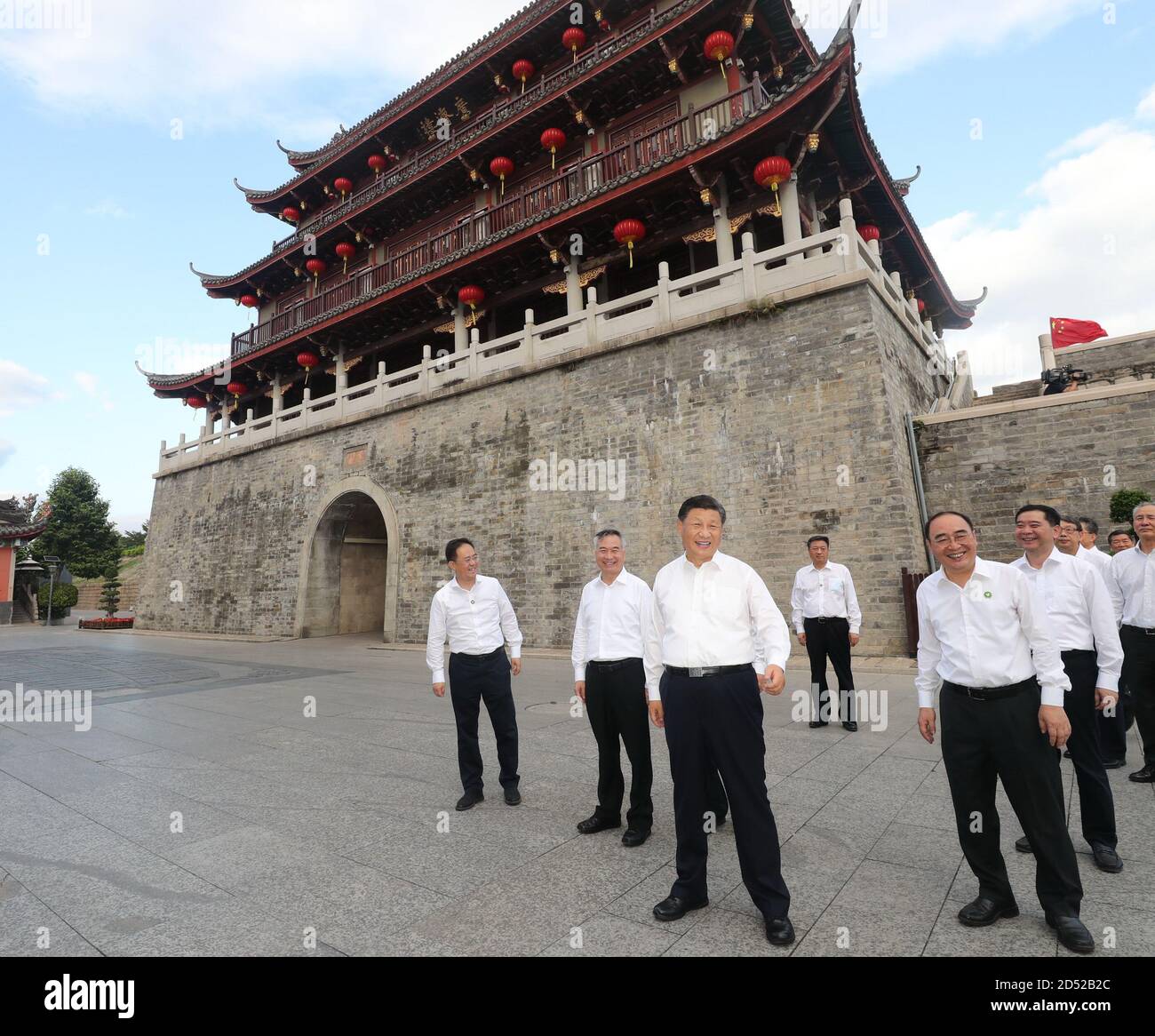 (201012) -- CHAOZHOU, Oct. 12, 2020 (Xinhua) -- Chinese President Xi Jinping, also general secretary of the Communist Party of China Central Committee and chairman of the Central Military Commission, visits an ancient gate tower and a street lined with ancient memorial archways to check the restoration and protection of cultural relics, the inheritance of intangible cultural heritage and the development of cultural and tourism resources in Chaozhou, south China's Guangdong Province, Oct. 12, 2020. Xi on Monday arrived in Guangdong to begin an inspection tour of the province. (Xinhua/Wang Ye) Stock Photo