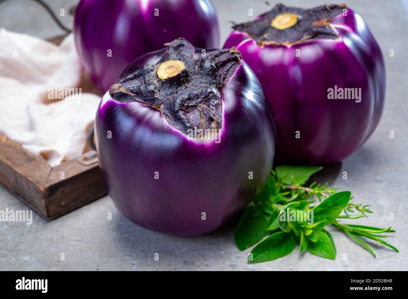 Fresh ripe sicilian purple globe eggplants vegetables ready to cook