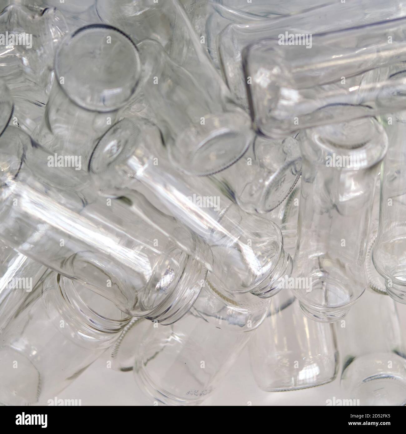 Collected glass bottles for recycling, background Stock Photo Alamy