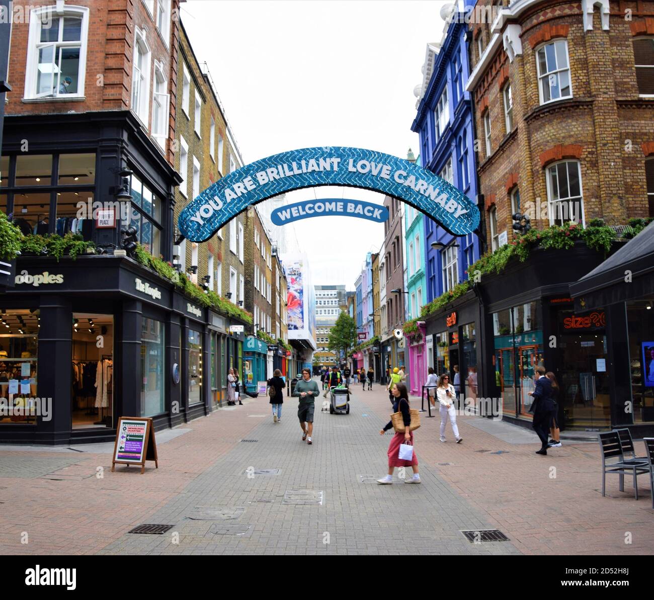 Welcome Back sign at Carnaby Street, London, as shops reopened after the lockdown in 2020. Stock Photo