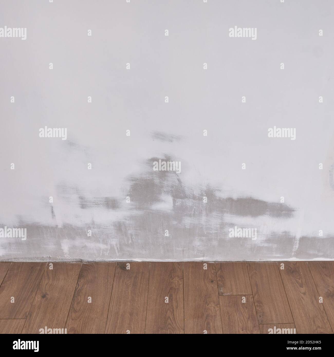 Wall with cleaned plaster after removing mold Stock Photo Alamy